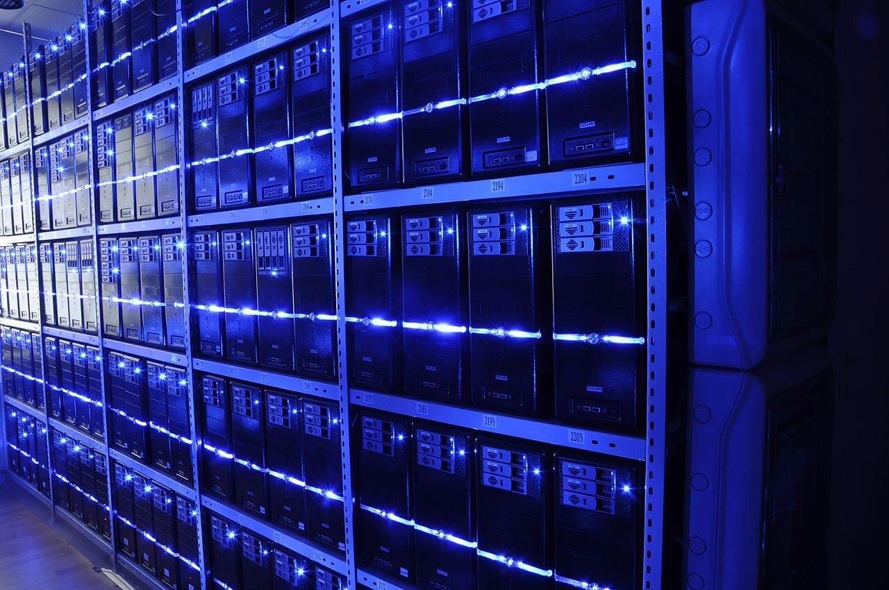 Rows of blue-lit servers in a data centre